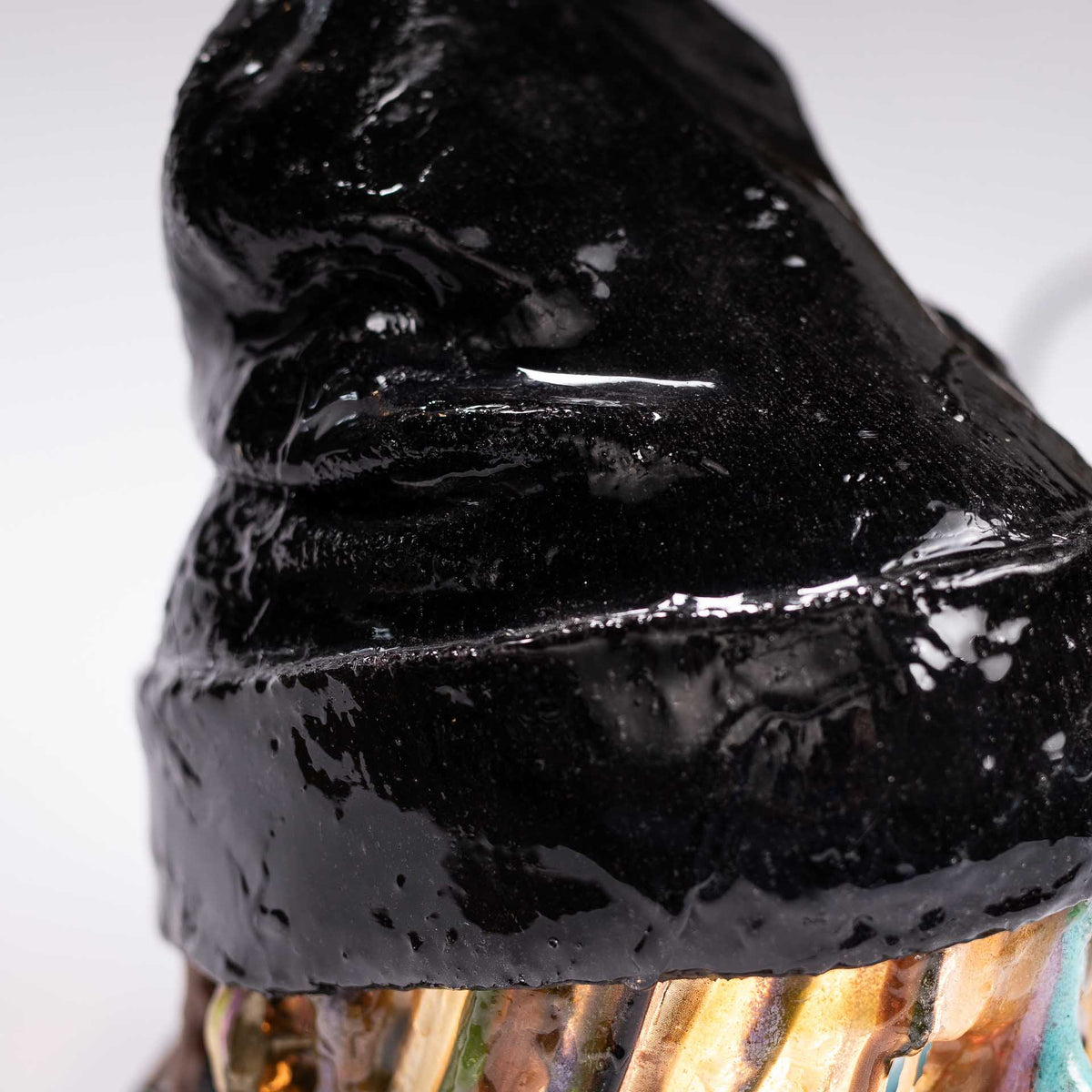 Detail of the glossy black winter hat