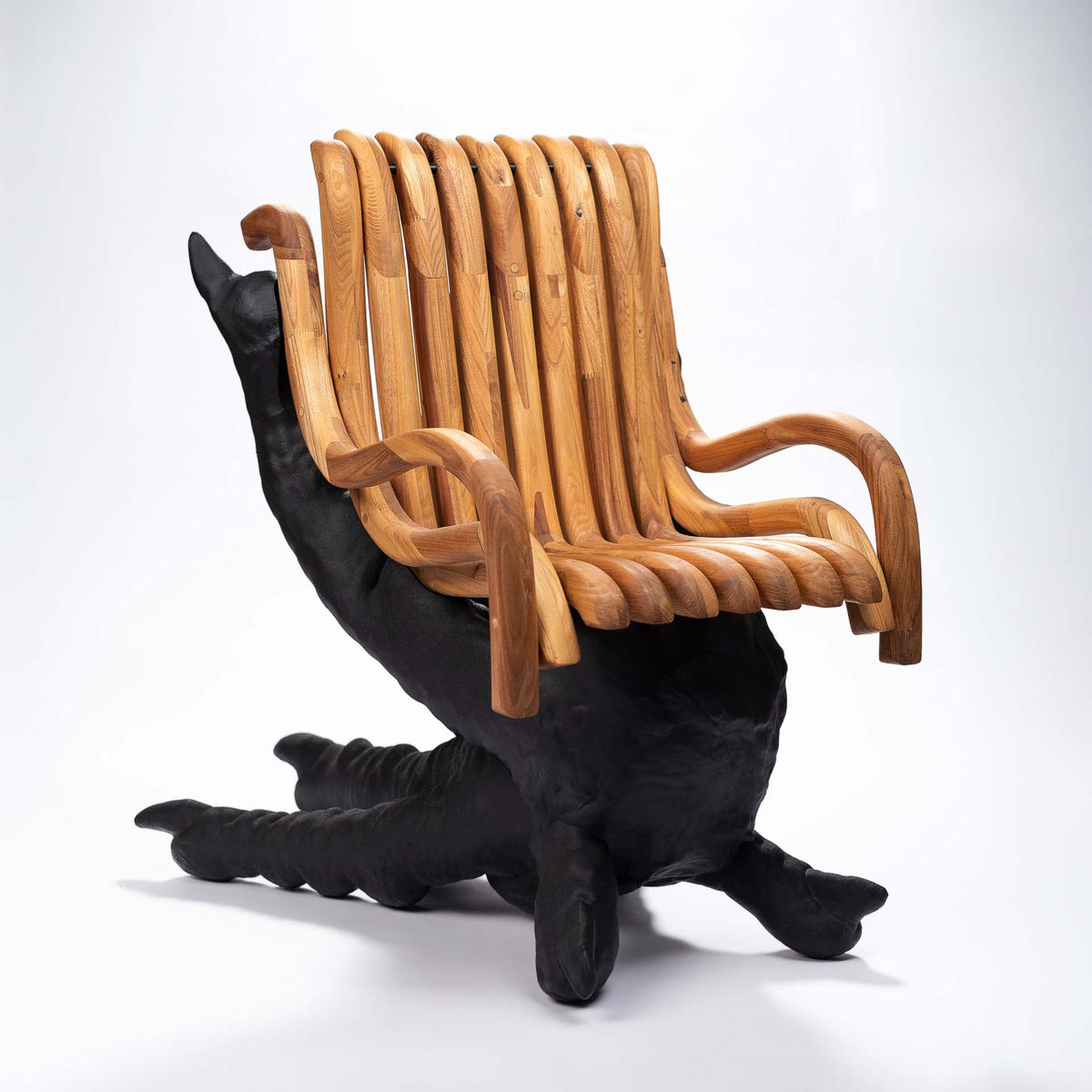 Chicken Feet Chair: slatted wild-oak seat on black 3D-printed chicken feet, front three-quarter view