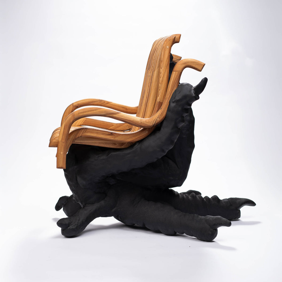 Chicken Feet Chair, side view showing the seat profile