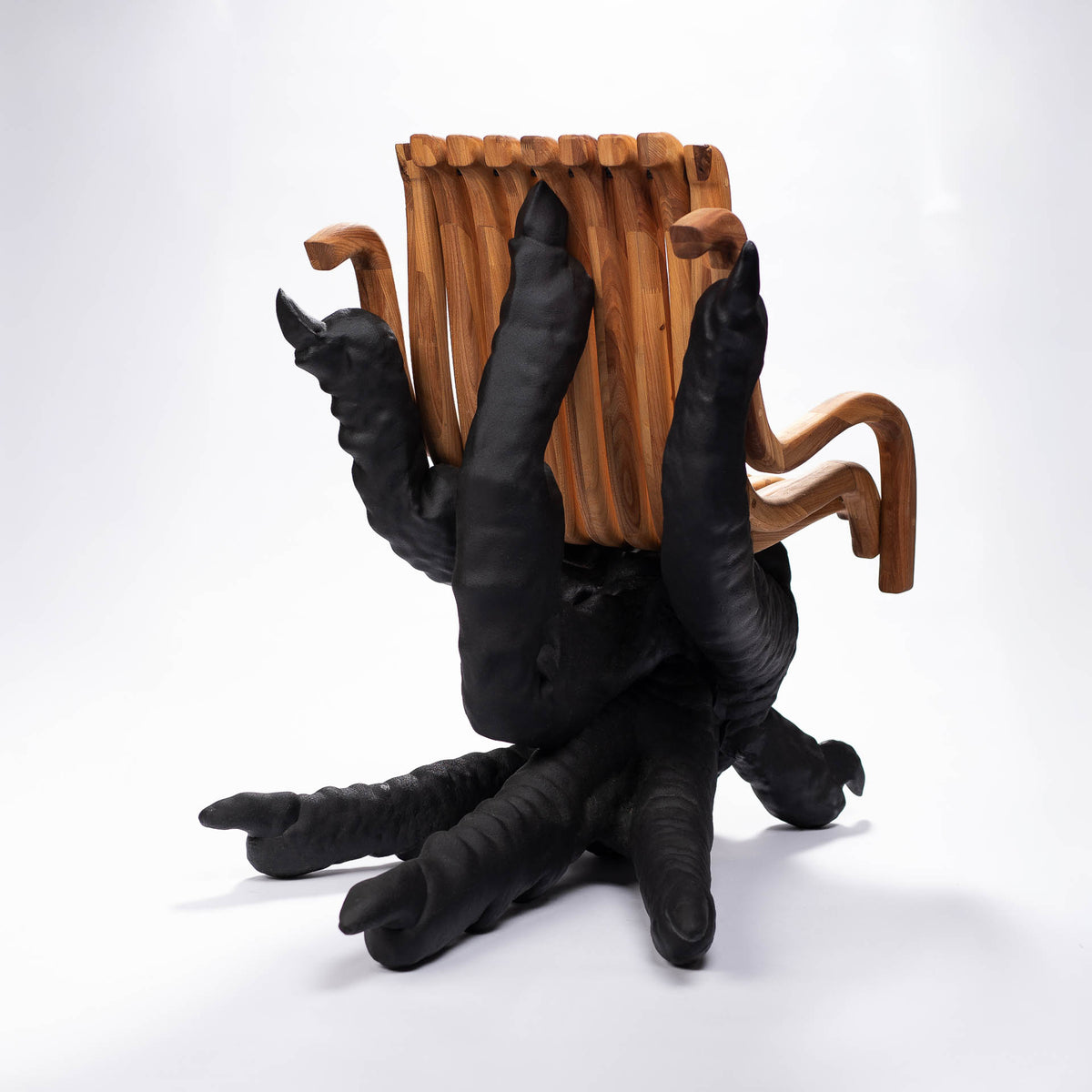 Chicken Feet Chair, rear view with the toes of the chicken feet reaching behind the backrest